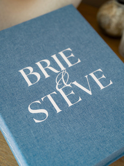 French Blue | Close-up of white vinyl personalization on linen cover